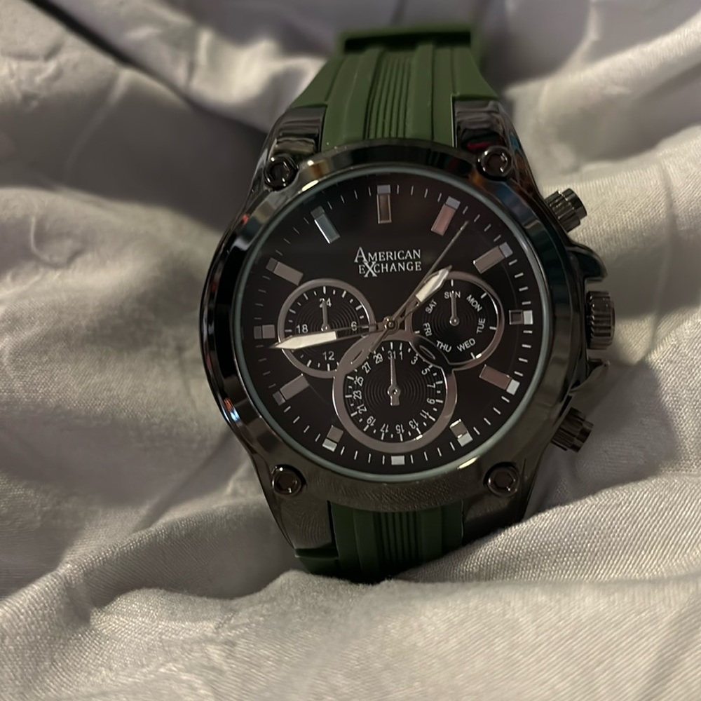 American Exchange Stainless Steel Back Watch